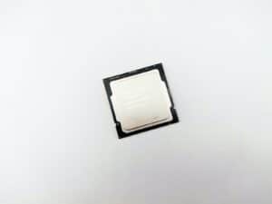 a cpu chip sitting on top of a white surface